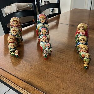 Authentic Russian nesting dolls, multiple sets and pieces.